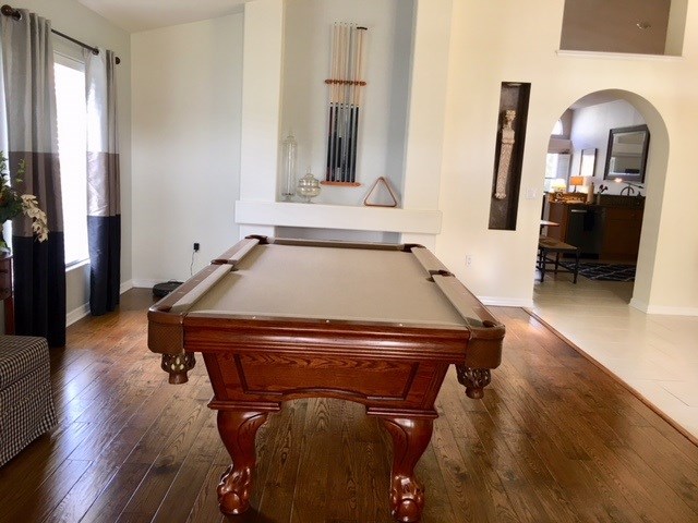 formal living/dining area currently houses a pool table and equipment.  owner is leaving the pool table for you to enjoy